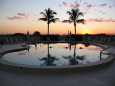 Island Reef condo pool at sunset.